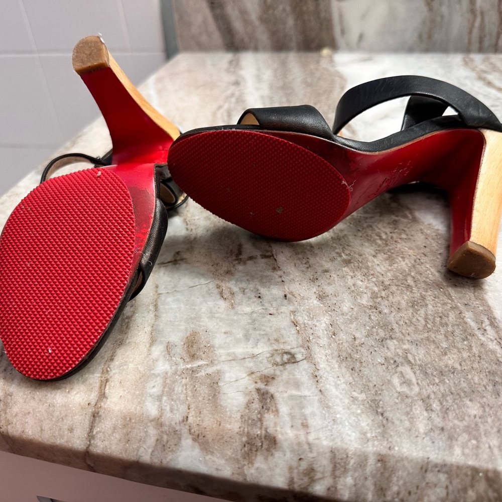 CHRISTIAN LOUBOUTIN
Etri Wood Leather Slingback Sandals